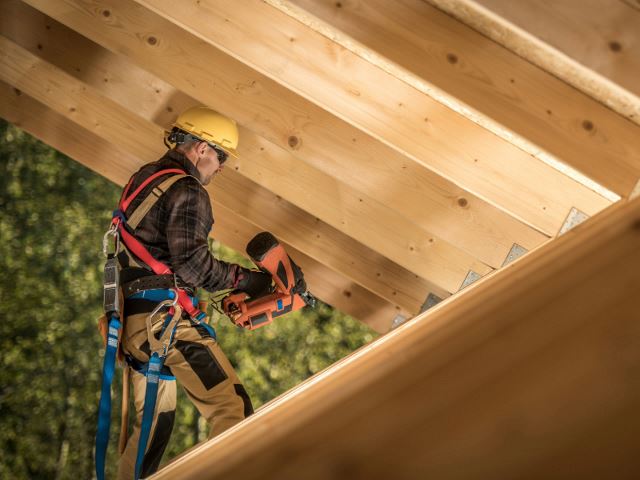 Carpenter framing a roof