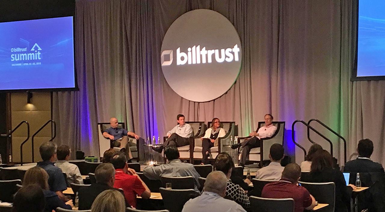 speaker panel on stage at billtrust summit