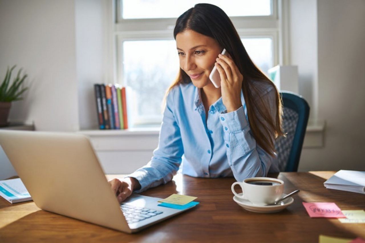 Female Accounts Recieveable employee on Computer working Virtually