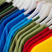 Colorful shirts on hangers